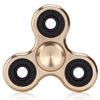 A gold-toned aluminum alloy fidget spinner with four bearing holes.