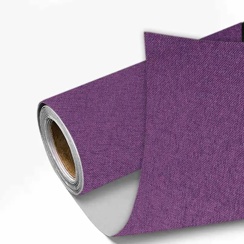 Roll of purple linen book binding cloth used for albums and scrapbooks
