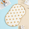 A cream-colored flat pillow decorated with small tan bear shapes on a light blue background.