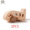 Two wooden train cars with numbered windows used as a Montessori educational toy for toddlers