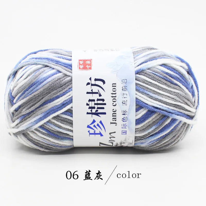 A ball of light blue and gray yarn labeled as Jane cotton yarn for knitting and crochet