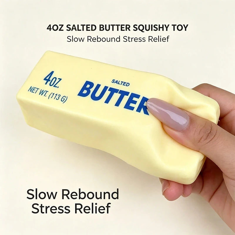 A hand holds a yellow salted butter squishy toy for stress relief.