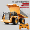 An orange 9CH alloy RC dump truck with a cab and dump bed is shown next to its remote control.