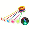 A set of glowing colored skip balls with elastic strings for active play and balance training.