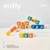 A collection of Miffy keycap pendants in various colors and shapes displayed on a white box.