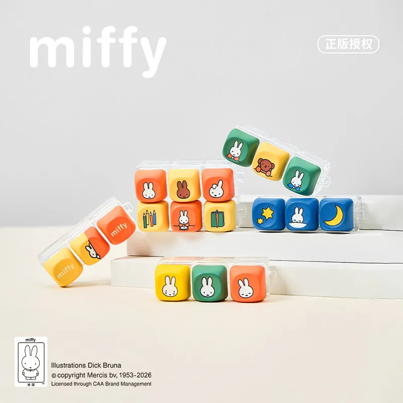 A collection of Miffy keycap pendants in various colors and shapes displayed on a white box.