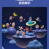 A collection of collectible figurines depicting characters in space against a starry night background.