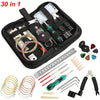 A black pouch containing a 30 in 1 guitar repair tool kit with various tools and accessories.