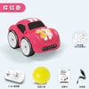 A pink RC car with yellow racing stripes is shown next to its accessories including a battery and instruction manual.