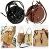 A set of brown and black crochet dumpling bags with adjustable straps and hardware for crafting