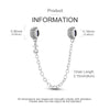 Sterling silver charm beads on a chain with a bail and a small silver charm.