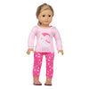 A pink unicorn pajama set for an 18-inch doll featuring a long-sleeved top and matching patterned pants.