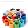 A set of wooden color sorting game featuring rainbow colored balls and cups for early education