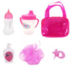 A set of pink and white doll feeding and care accessories including a bottle, a cup, a silicone pouch, and a pink silicone ac