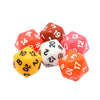 A set of twenty-sided dice in various colors including red, orange, white, and yellow.