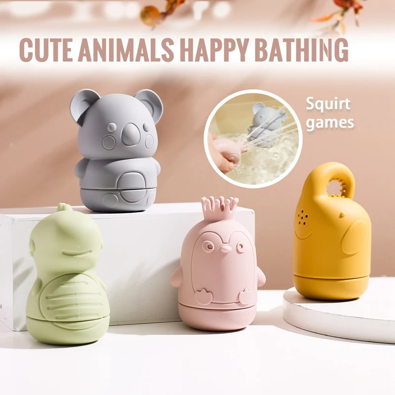 Three soft silicone animal bath toys in gray, pink, and yellow are shown with a close-up of a bird playing with water.