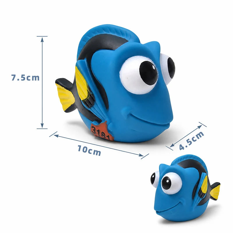 A blue rubber floating animal toy resembling a fish with yellow accents, shown with dimension lines.
