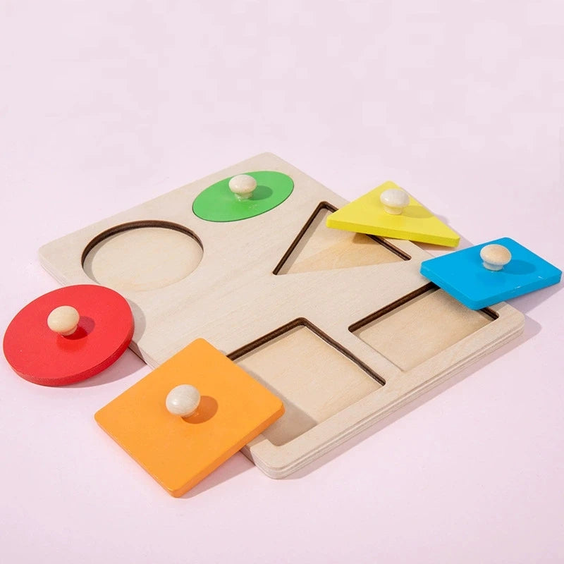 A wooden Montessori shape and color sorter puzzle with various colored triangular and circular pieces for toddlers.