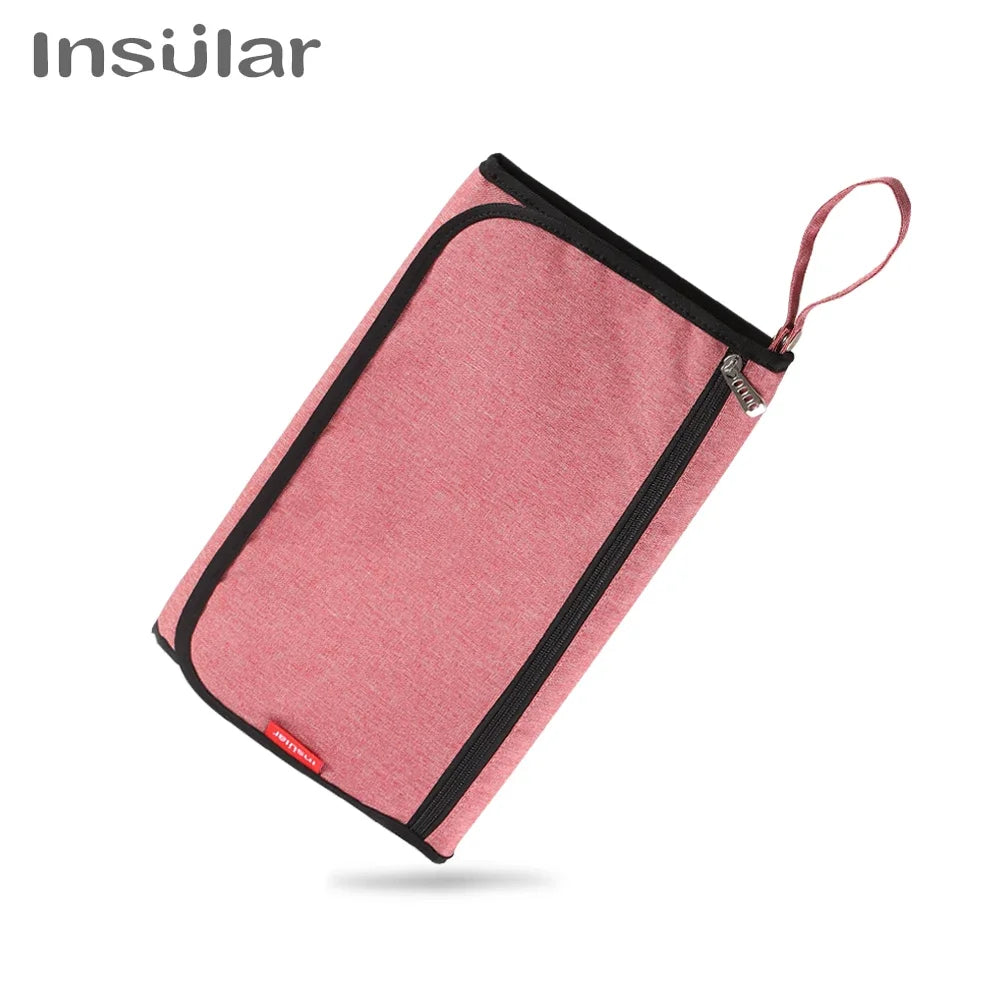 A pink portable 2-in-1 baby changing mat with a storage bag and drawstring.