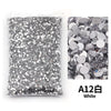 Bag of white flat-back resin rhinestones for DIY craft and nail art