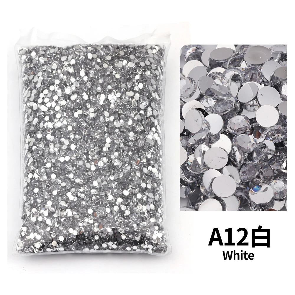Bag of white flat-back resin rhinestones for DIY craft and nail art