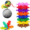 A colorful set of spherical building blocks in various colors like pink, red, purple, orange, blue, green, and yellow.