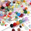 A close-up view of a vibrant mix of colorful glass beads for DIY jewelry making