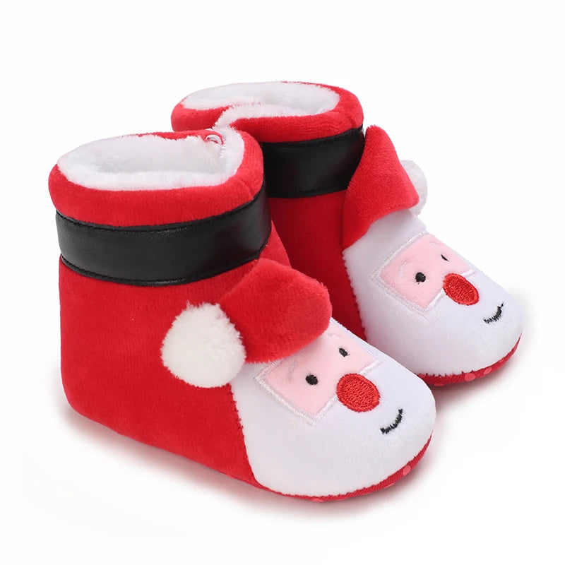 A pair of red and white animal-themed baby first walker shoes with black trim.