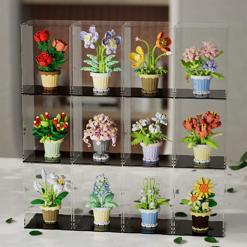 A display of building block flower bouquet kits featuring roses and sunflowers in various colors and arrangements.