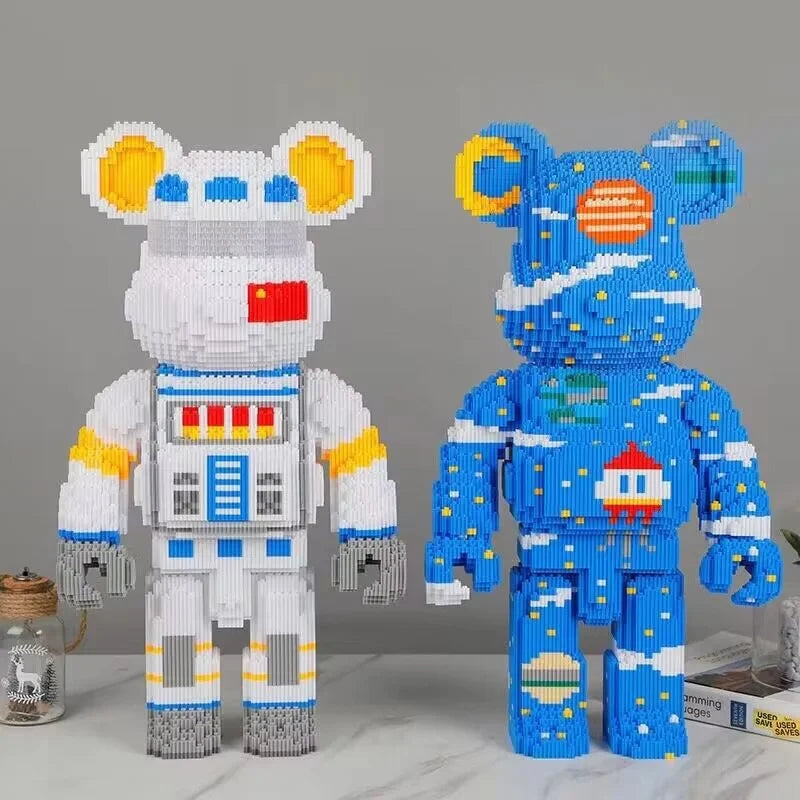 A white and blue cartoon bear building kit made of interlocking plastic bricks.