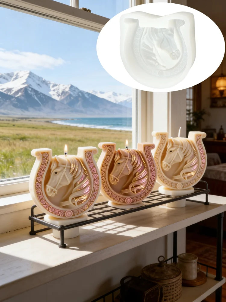 A set of white ceramic candle molds shaped like horses with Celtic knot designs displayed on a shelf by a window.