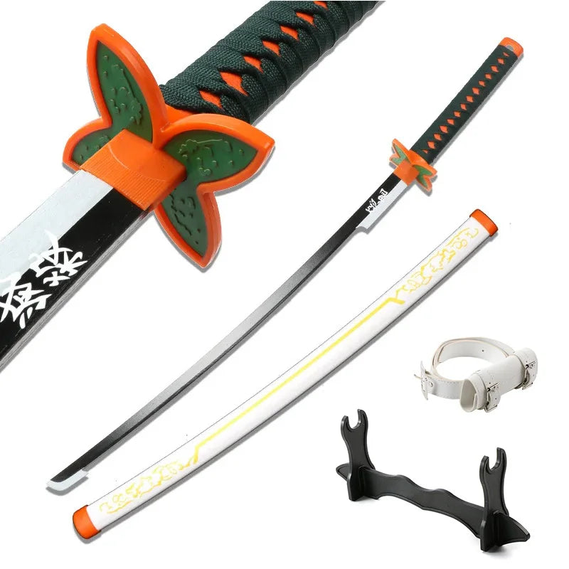 A Demon Slayer anime katana sword with a green handle and orange guard, shown alongside a white bamboo sword and a separate h