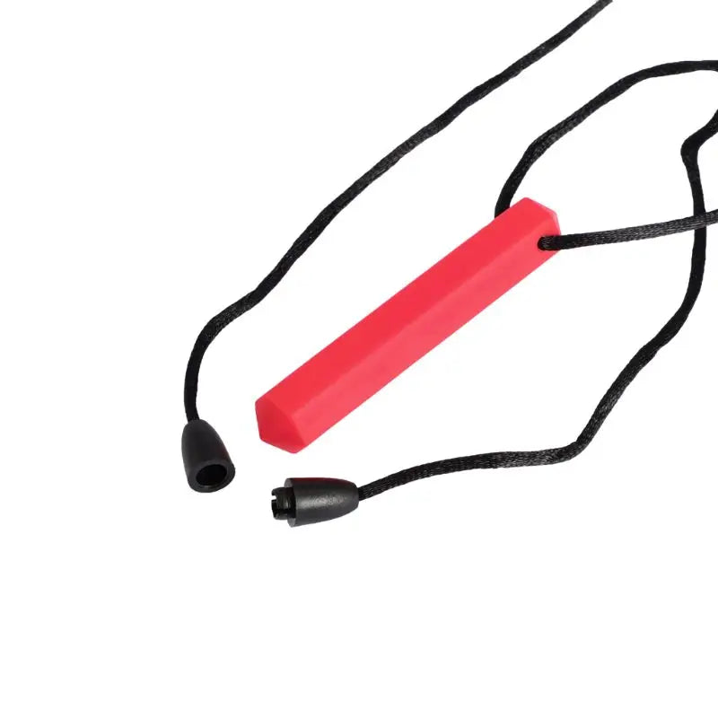 A red silicone chew necklace with black cord and a small bead.