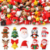A collection of red and gold silicone beads shaped like Santa figures, reindeer, and Christmas trees for craft jewelry.