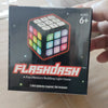 A box for the Flashdash memory building light game cube with flashing lights.