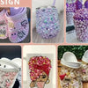 A collection of pink and white resin crafts featuring various combinations of rhinestones and pearls for DIY projects.