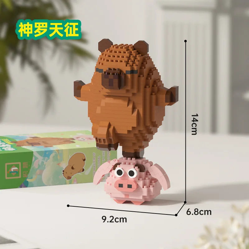 A small, brown building block figure of a capybara is shown next to its original packaging.