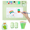 A green silicone painting mat set featuring a watercolor palette, paint colors, and brushes for kids' art.