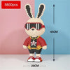 A fully assembled building block figure of a rabbit wearing sunglasses and a red shirt.