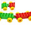 A large building block traffic vehicle set made of green and red blocks with yellow wheels.
