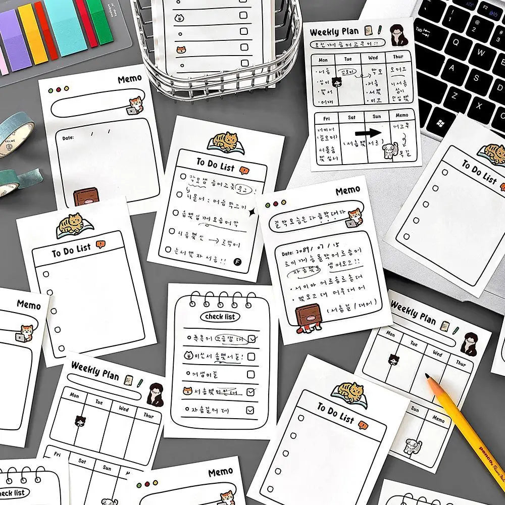 A collection of cute stationery memo pads, weekly plans, and to-do lists for daily planning and notes.