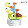 A set of 190 building blocks shaped like a rose flower bouquet, featuring yellow and light blue pieces.