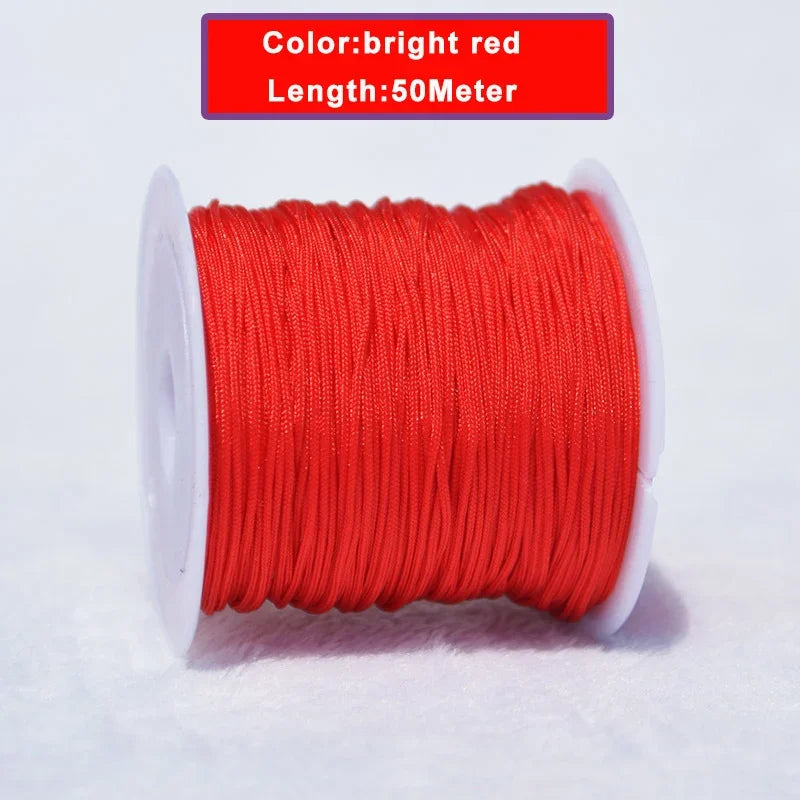 A spool of bright red nylon knotting cord for jewelry making, 50 meters long.