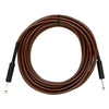 A coiled brown instrument cable with black connectors and noise reduction shielding.