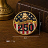 A round lapel pin featuring a ship silhouette over a patriotic background with the text AMERICA'S NAVY 250