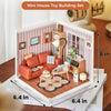A mini house toy building set featuring a cozy living lounge interior with furniture and decorative elements.