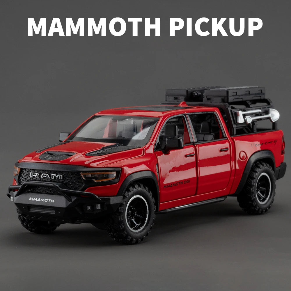 A red RAM Mammoth pickup truck model with a black roof rack and off-road tires.