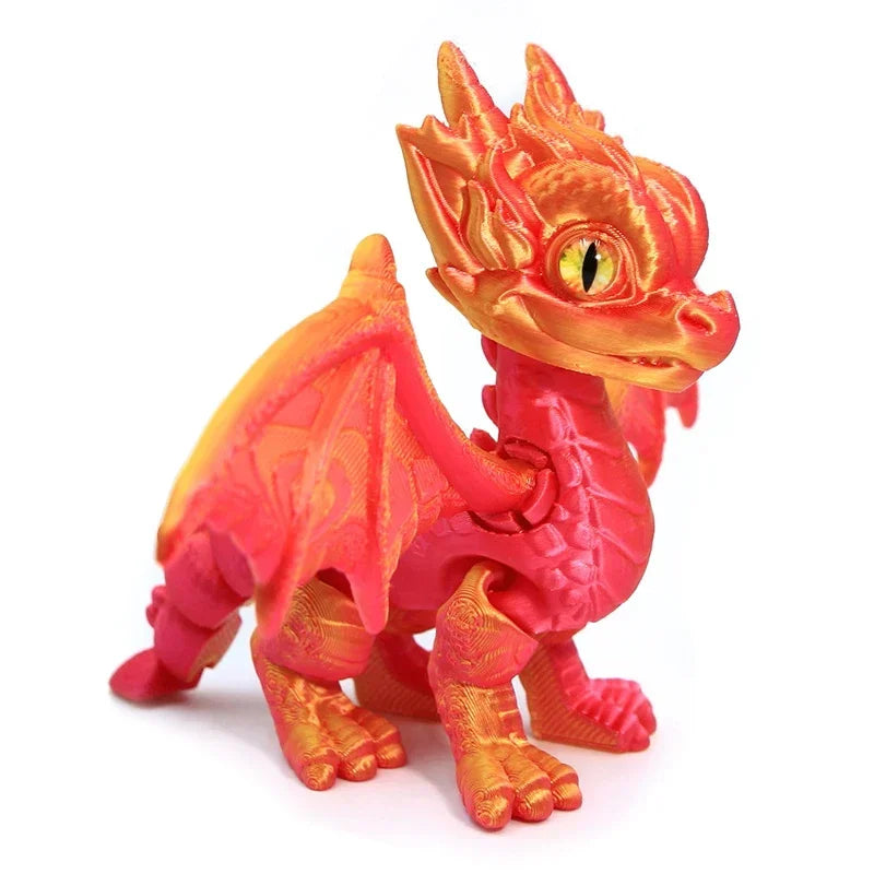 An articulated 3D printed dragon figurine in orange and red hues.