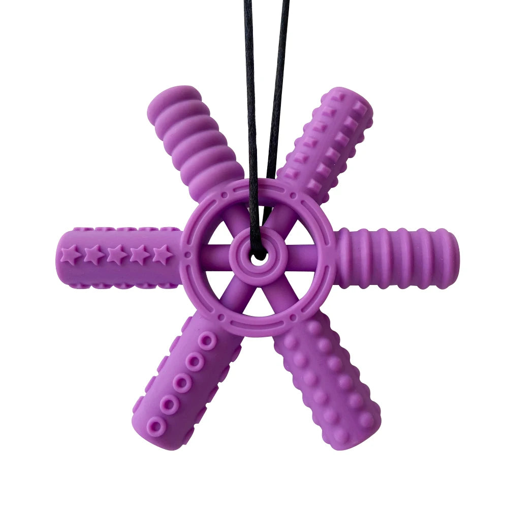 Purple silicone steering wheel teether for babies and toddlers