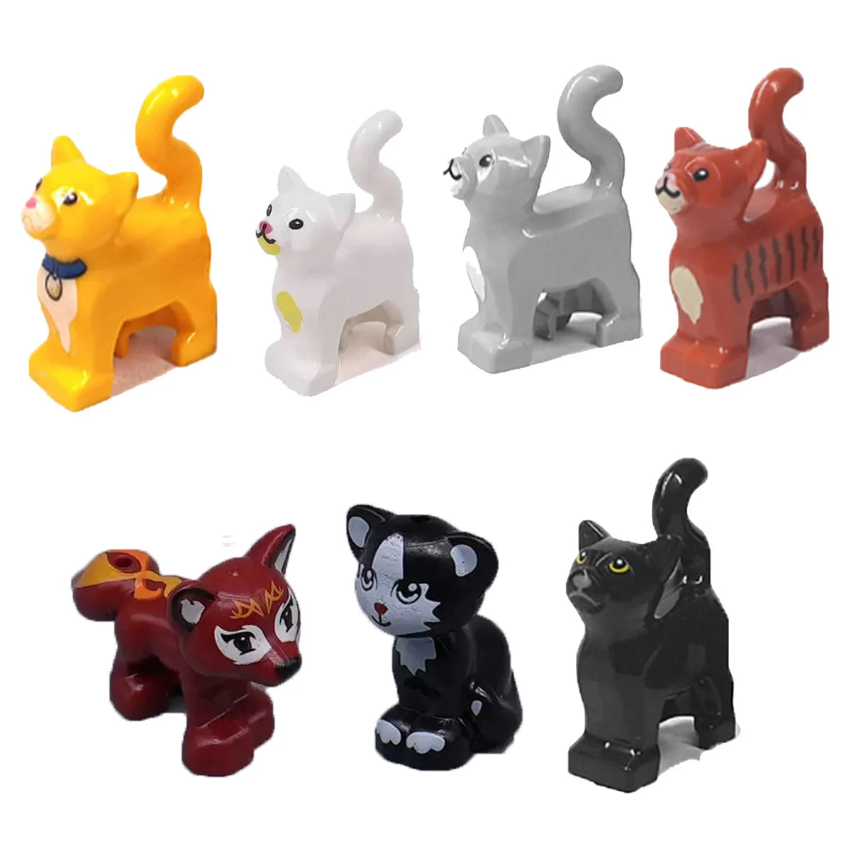 A set of six African wildlife animal building blocks in various colors including yellow, white, gray, orange, red, and black.